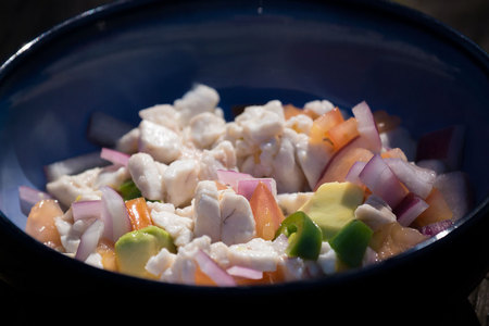 February 10, 2015:  Ceviche:  raw fish "cooked" in the acid of lemon juice, onions, avocado, jalapeno and tomato.  Youngest son catches the fish and makes the tasty mix, proud of his success and treat.  Each day is a chance for treats...and color and spiciness.  Still...life.