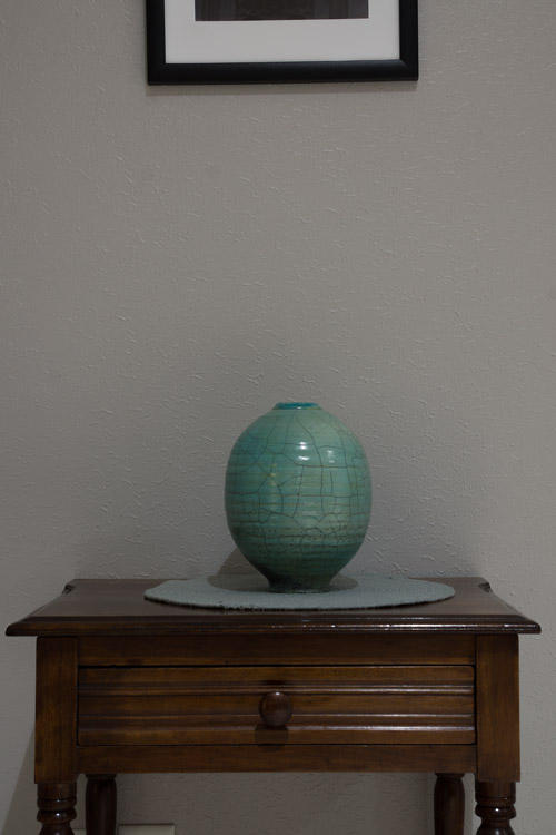 April 16 A wash table that has been in the family for well over 100 years and was lovingly refinished by a former boss, as the home for a raku art piece given to me as a thank you for my work for the art program at a previous employer. Beautiful items and beautiful memories.