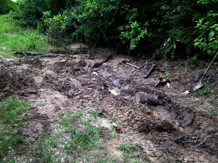 June 5, 2015:  My son and I dug out the tractor that had been stuck for a month.  Hard work, basic tools and diligence can remove things from which they are stuck...tractors, lives or anything in between.