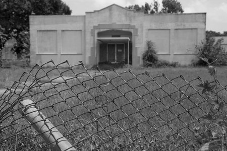 July 6, 2015:  This abandoned school, once a symbol of education, learning and young lives is now not much more than a ruin.  If the walls could speak...  I hope its alumni have fared better than it.  Still...life.