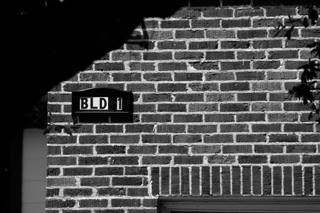 August 23, 2015:  For more than a decade, I have parked facing this building when I teach photography classes.  Sitting across from where classes happen, it inspires images and questions.  I need to walk across that street.  Still...life.