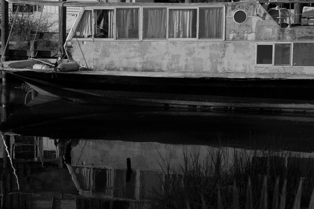 October 1, 2015:  This old Chris Craft, once a glory in her day, now sits full of stories and largely overlooked.  I'd love to hear the stories.  Still...life.