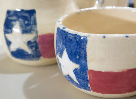 October 9, 2015:  Whether flapping in the breeze or emblazoned on a mug, the Texas flag always makes this Texas boy smile.  Roots matter.  Still...life.