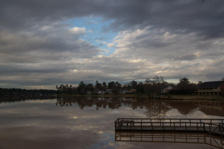 January 25   Normally, the chocolate milk color of the water is not considered beautiful, but it celebrates differently the colors of the sky. Keep your eyes open for things that aren't as beautiful as they usually are; they are simply differently beautiful to be seen with new eyes.