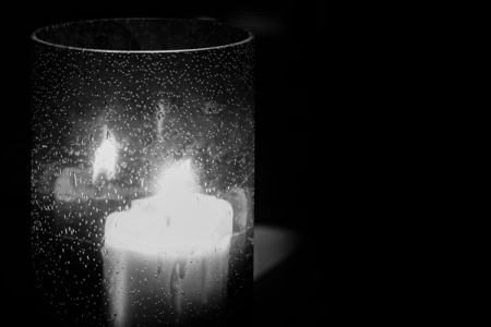 April 29   A candle to light the patio for a quiet time over wine with my wife.  The candle, its light and the glass intrigue me. Always has, always will.