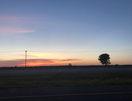 May 4 A quick grab shot at 60 mph while pulling a trailer to get a shot of a beautiful East Texas sunset at the close of the day.