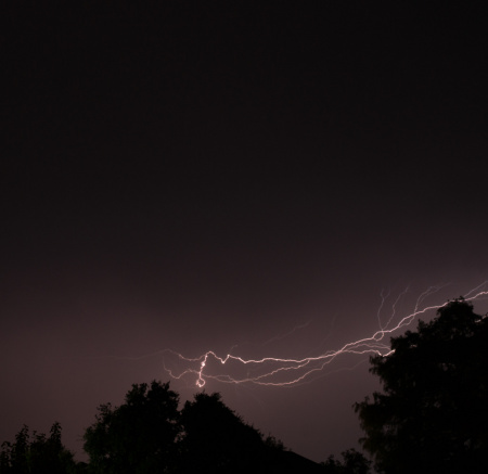 September 10  Storms rolling in, taking in the sights and sounds of a cool breeze, rain and lighting while my wife and I enjoy a drink...the beauty of nature, relaxation and peace in the moments.