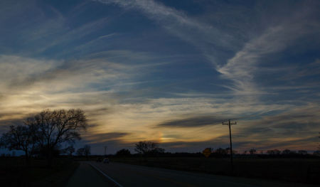 December 31  The last day of the year draws to a beautiful close, this image completing the project. Amidst the clouds, as in life, there is the hint of a rainbow ahead.  You have a beauty-full life...see it every day. 